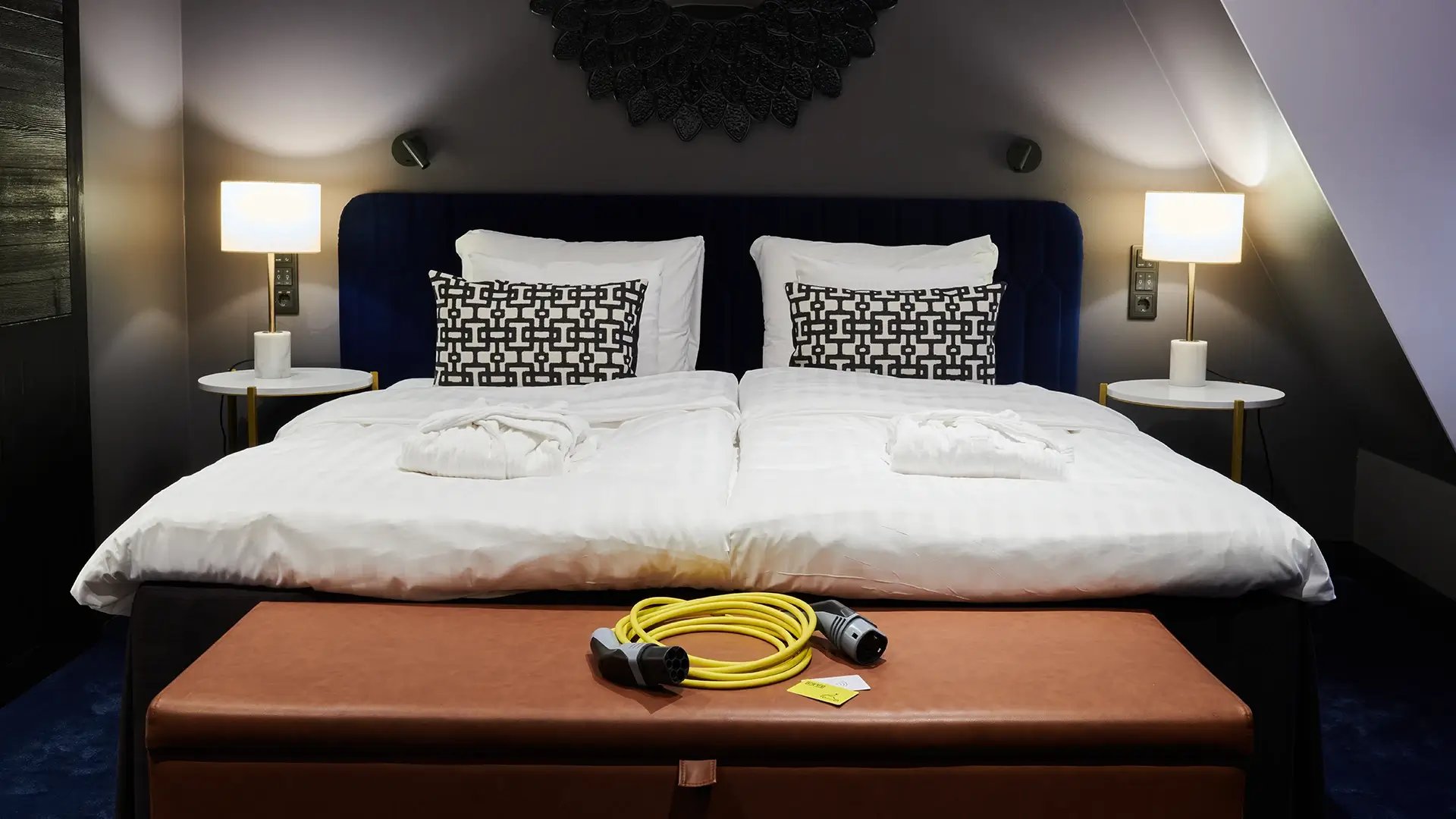Eco friendly hotel room electric vehicle charging accessories