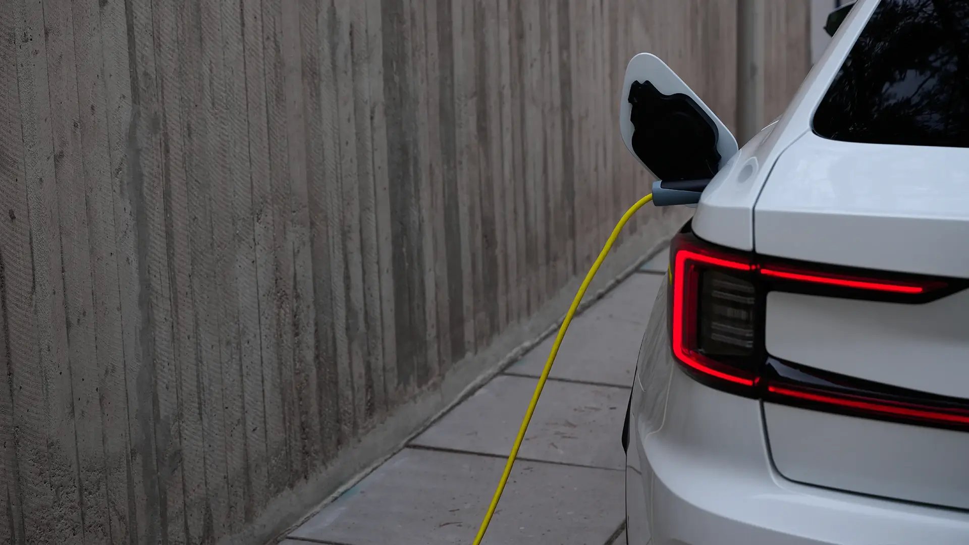 Urban area EV AC charging concrete background