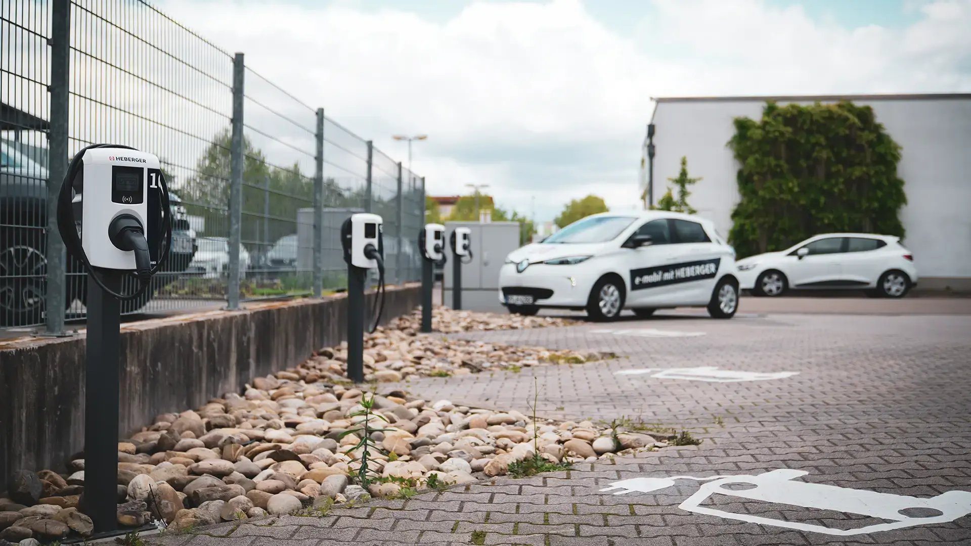 HEBERGER AC chargers in a parking lot
