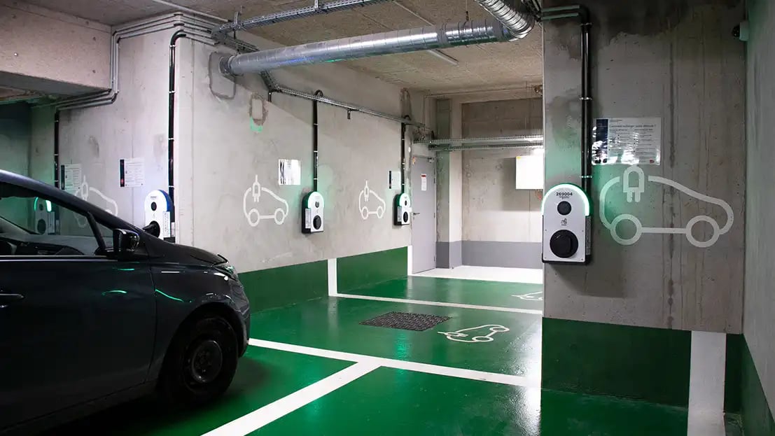 	Charging stations at the SNCF campus with company vehicles parked alongside