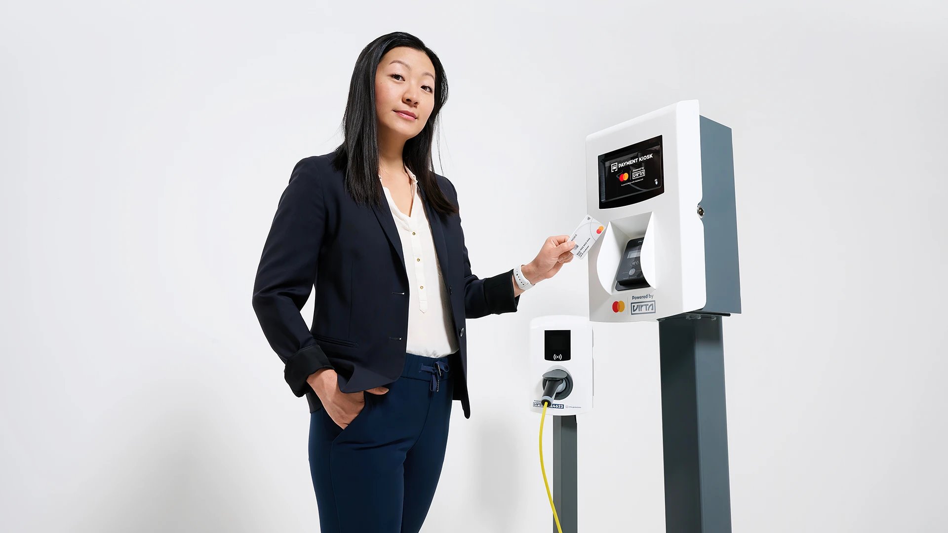 Virta press photo: EV charging Virta Payment Kiosk user interaction Photo: Ville Vappula