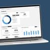 Virta Hub dashboard Macbook on blue background