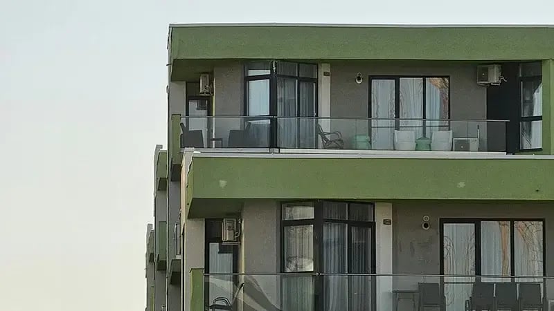 Modern apartment building exterior with balconies
