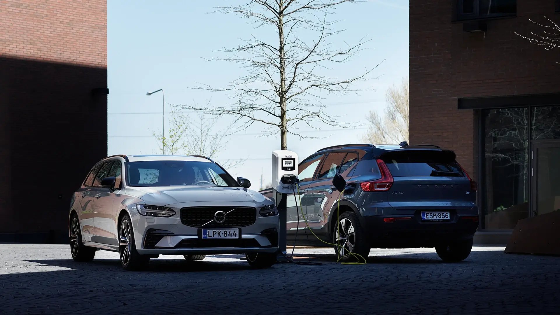 Electric car charging at dual AC charging station
