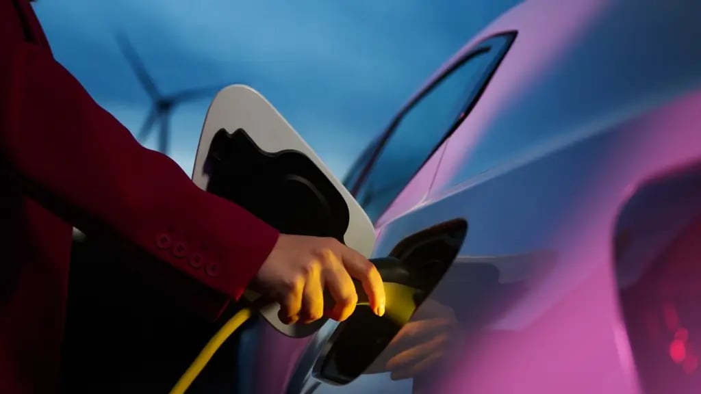 closeup hand woman charging a electric car